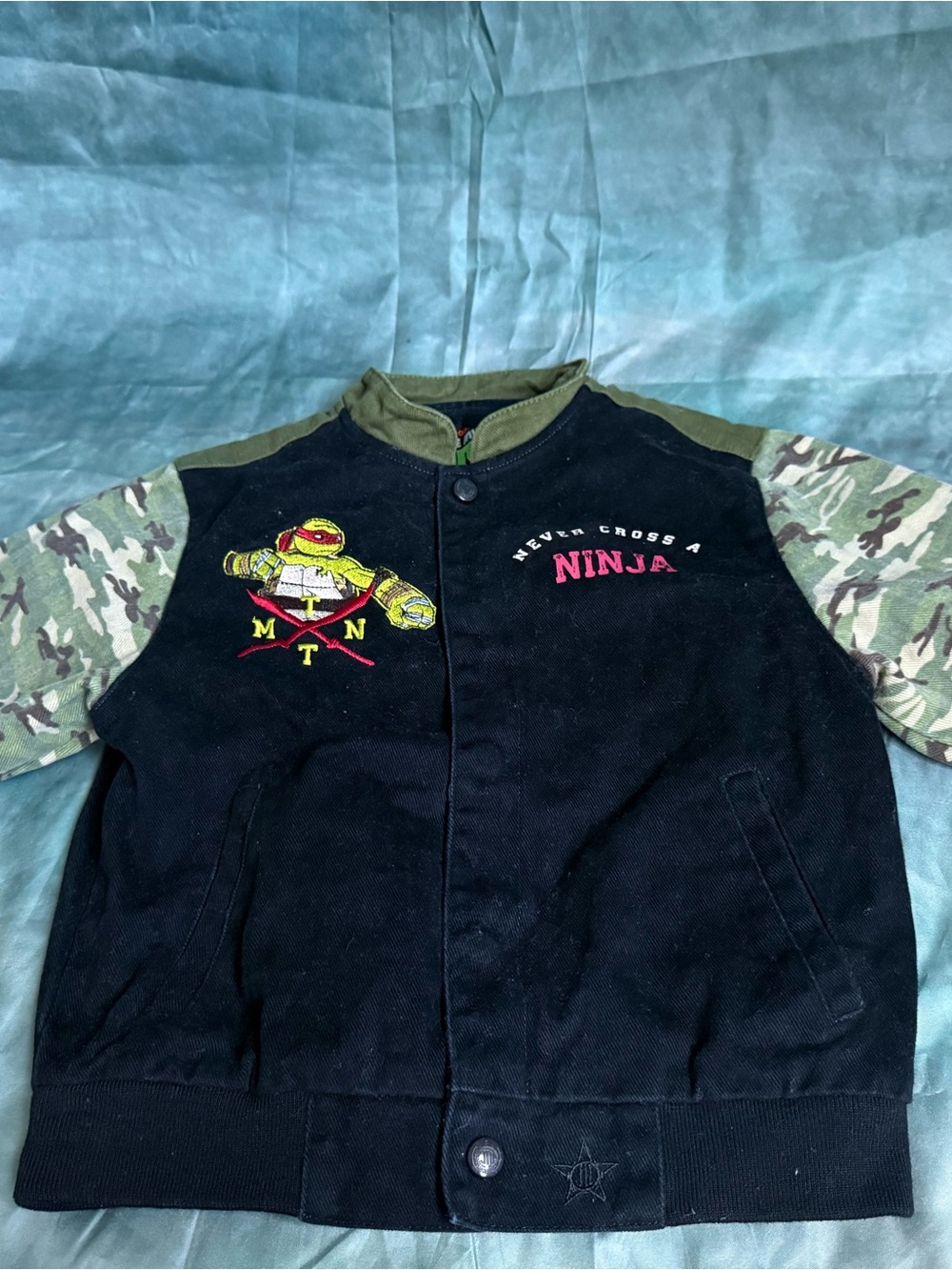 Nickelodeon Black Jacket with Green Camo Sleeves